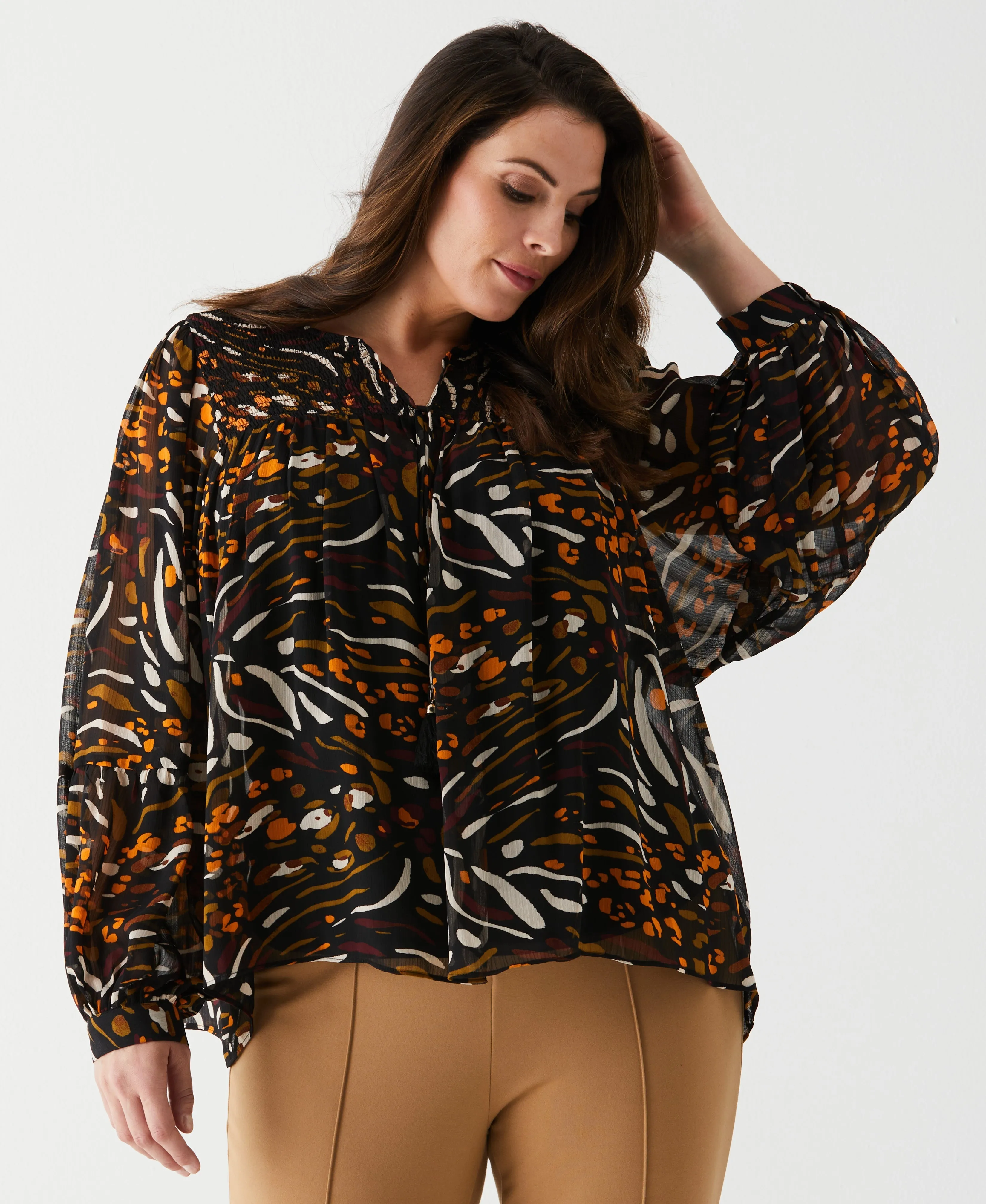 Plus Size Animal Print Smocked Split Neck Blouse